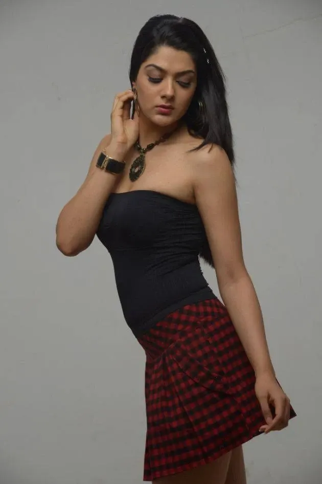 Sakshi Chaudhary long Legs Stills In Maroon Mini Skirt